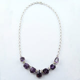 Silbercollier mit 7 geschliffenen Amethysten